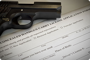 Image showing gun on paper